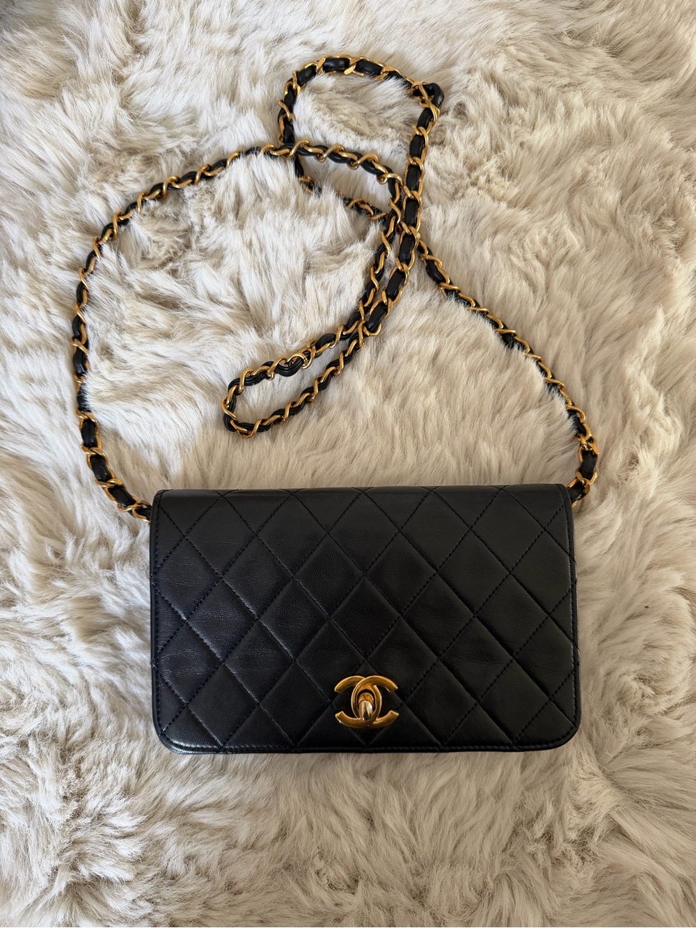 CHANEL Black Quilted Leather Crossbody with Gold-Tone Chain
